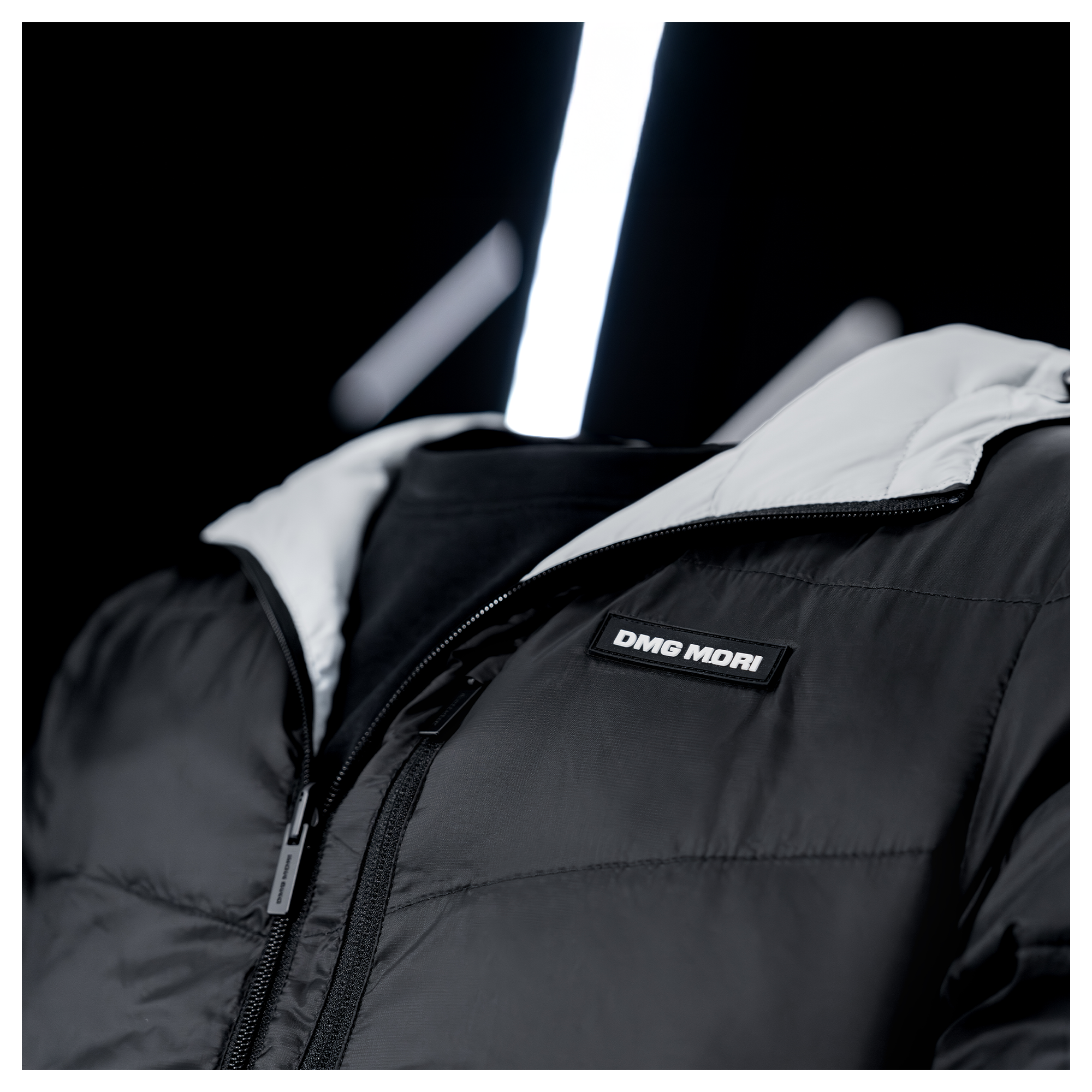 Product image: Unisex reversible puffer jacket two-tone black-grey