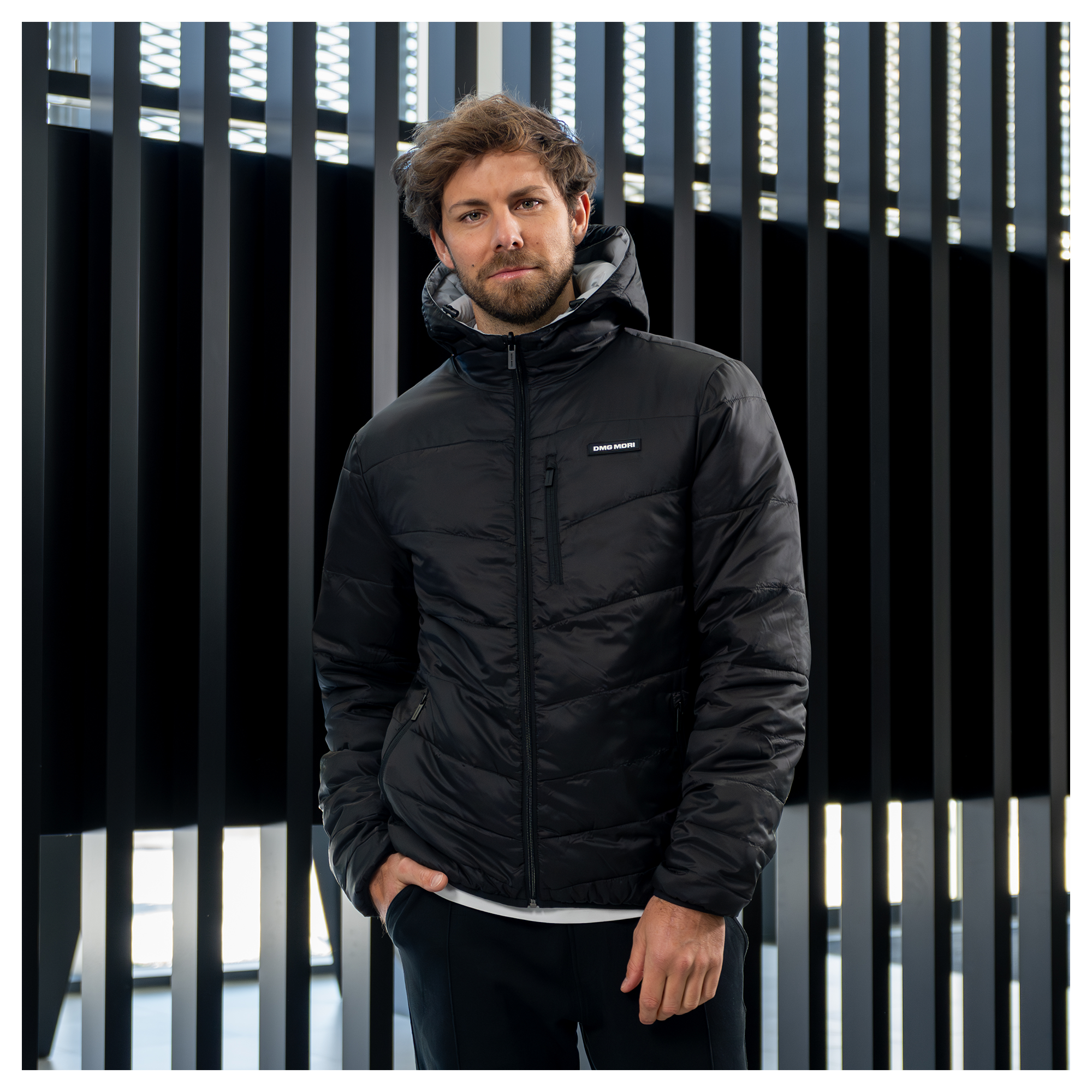 Product image: Unisex reversible puffer jacket two-tone black-grey